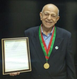 Alhaj Pyaralibhai Shivji with Husseini Medal and Citation.